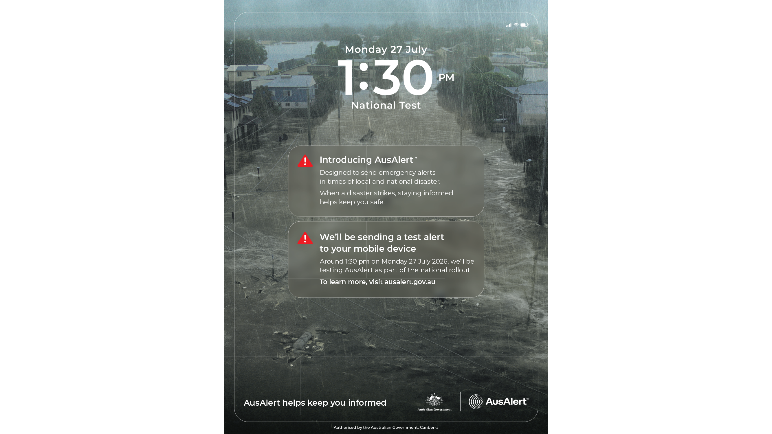 Aerial photo of a flooded town with heavy rain and rapid floodwaters. Overlay text and graphics make it look like a phone screen. Date/time shows Monday 27 July 1:30 pm and "National Test". Two notifications show 'introducing AusAlert' and 'We'll be sending a test alert to your mobile device". 